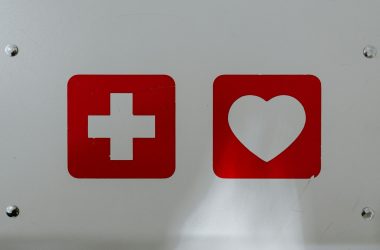 Photo by Claudio Schwarz red and white x logo