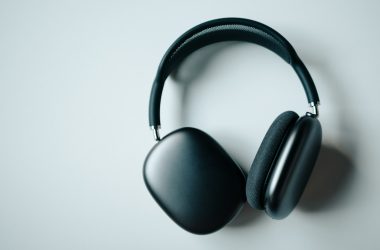Photo by Semeon Hrozian black wireless headphones on white desk